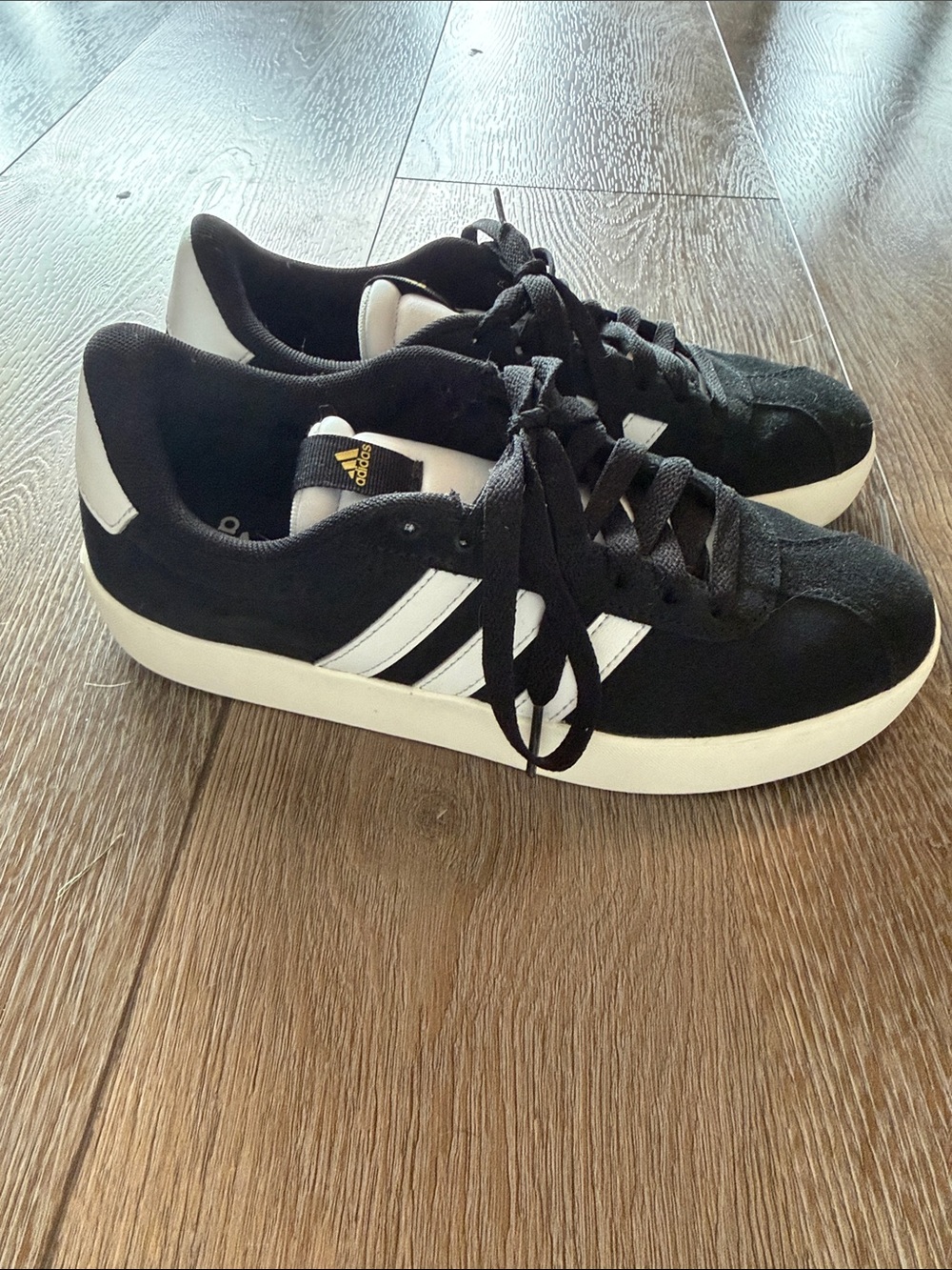 Adidas Women's Lifestyle VL Court 3.0 Sneakers in black with white stripes